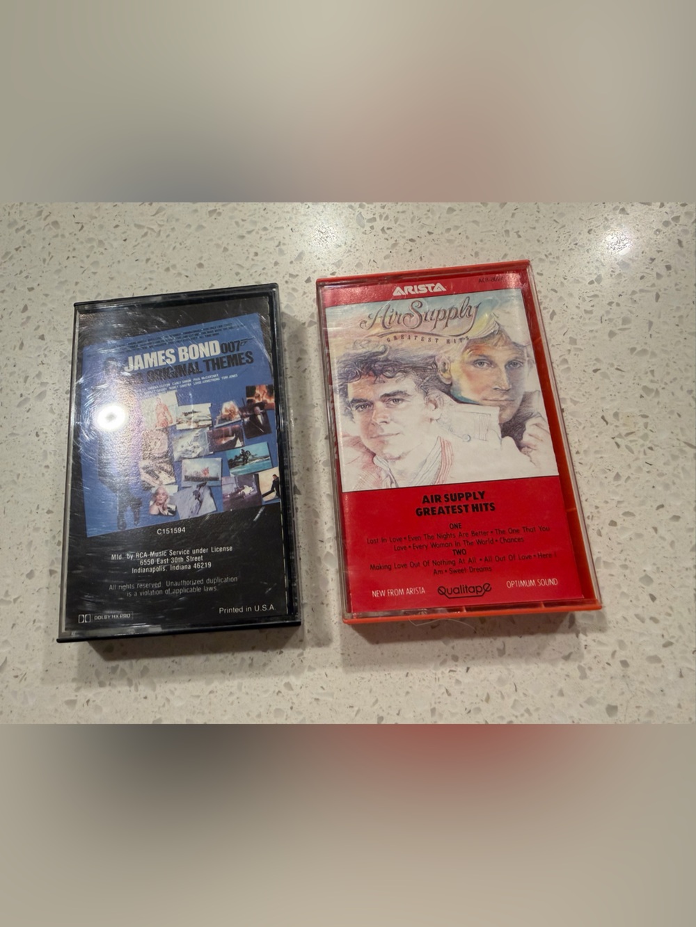 James Bond and Air Supplu Greatest Hits Cassette Tape - Red
